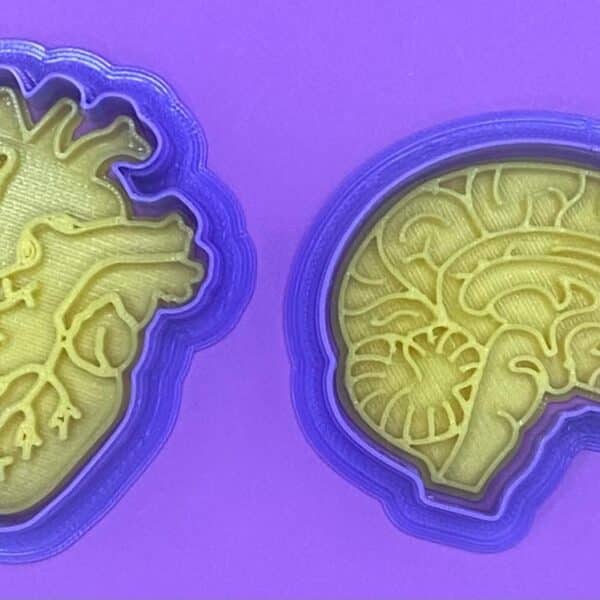 2 CORTADORES CON SELLO CEREBRO Y CORAZON 6.5 CM