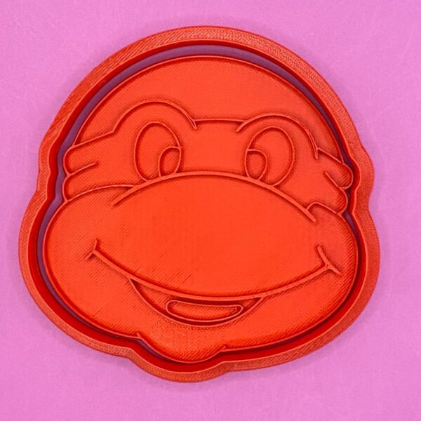 CORTADOR DE GALLETAS TORTUGA NINJA CON SELLO MARCADOR 10 CM
